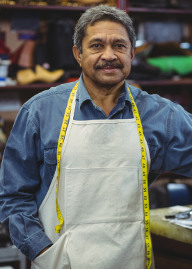 portrait-shoemaker-standing-with-hand-pocket 1